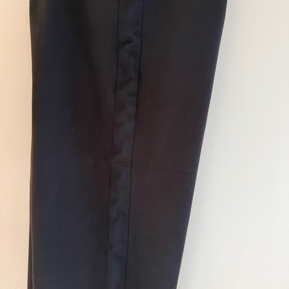Universal Standard wide-leg black pants with black side stripe.  Size M.